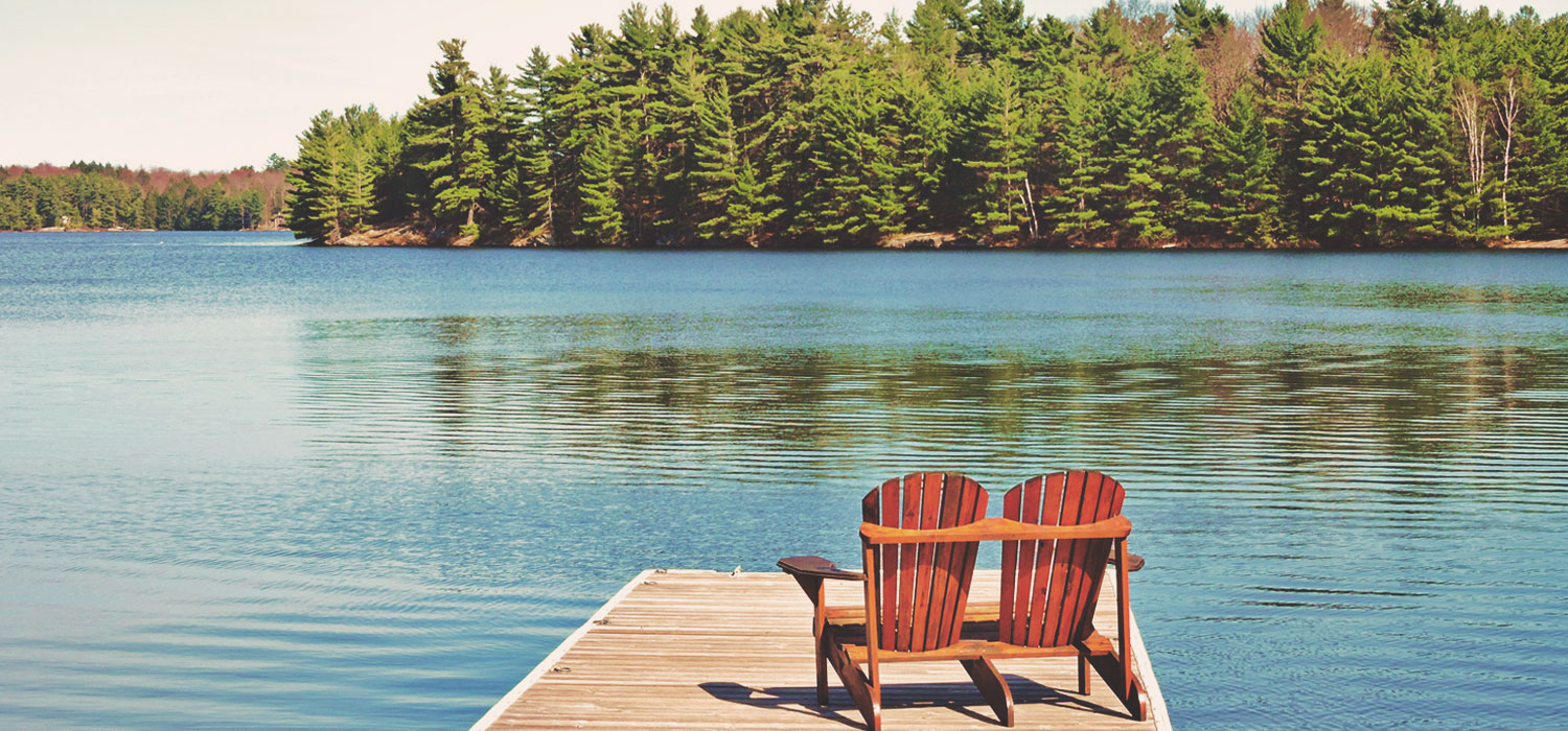 muskoka chairs on dock