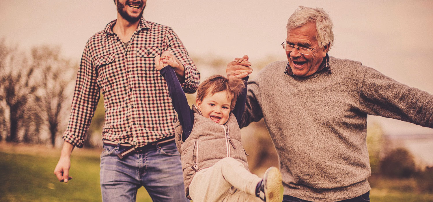 grandfather son and grandson playing